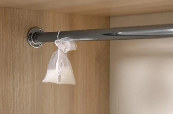 Scented sachet hanging in wardrobe for getting rid of smell