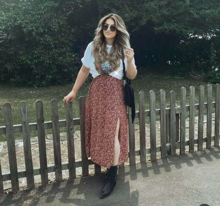 Girl wearing flowy maxi dress with loose top and ankle boots